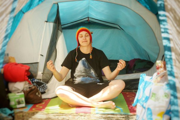 How to find campsites in the UK that offer yoga and wellness programs?
